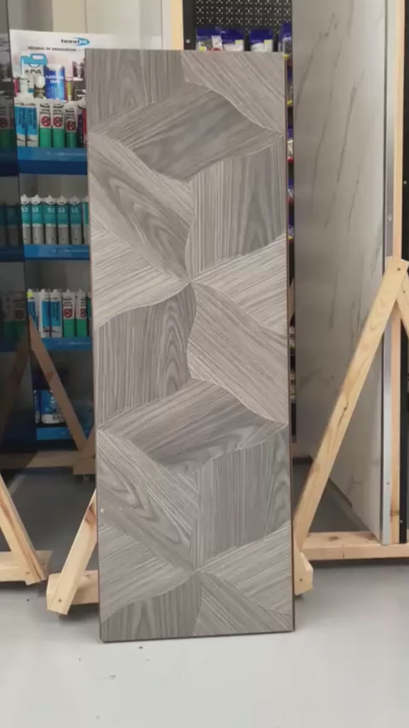 Barrel Grey Gloss Finish Lotus Parquet Laminate Flooring showing lotus parquet pattern detail