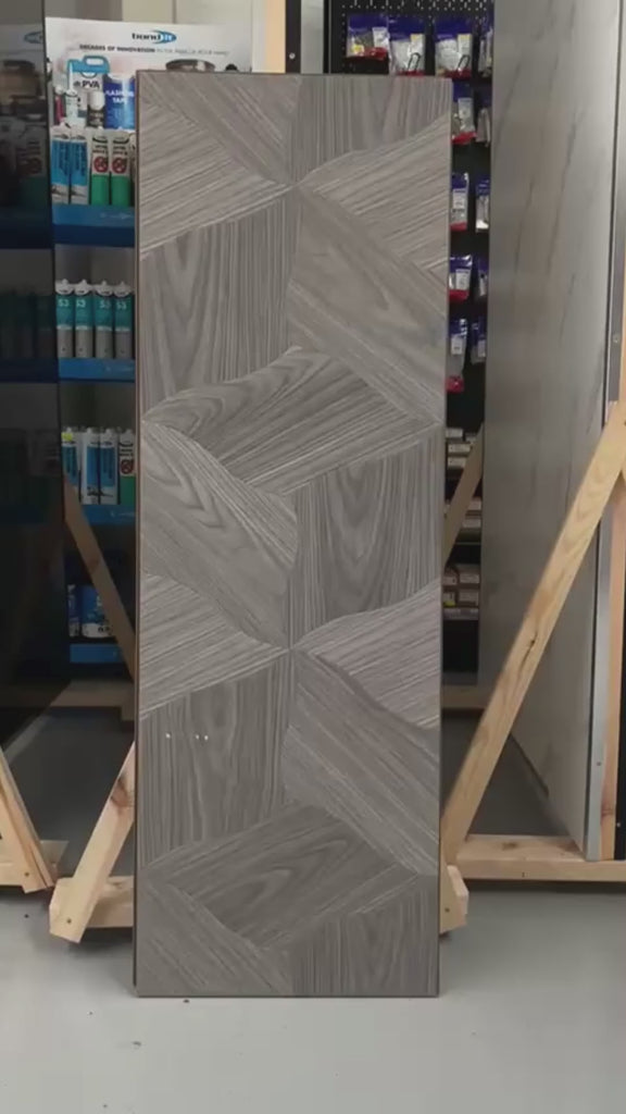 Barrel Grey Matt Finish Lotus Parquet Laminate Flooring showing lotus parquet pattern detail